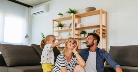 family feeling comfortable in a cool home